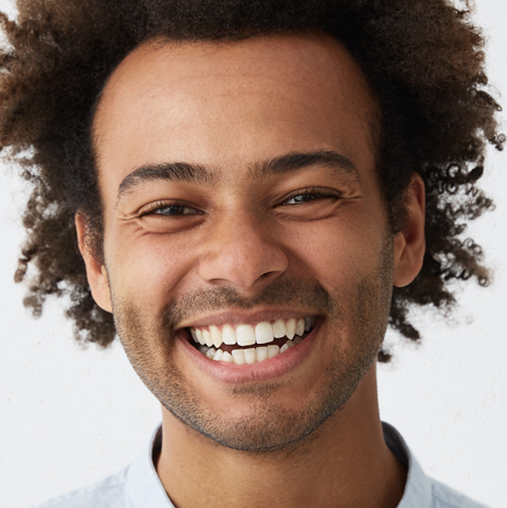 PREVENTATIVE CARE FOR ADULTS - Adult Male Smiling